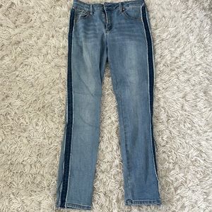 Blue jeans with darker blue stripe down the side